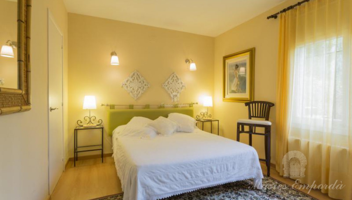 Perspectiva de un de las suites de la casa 