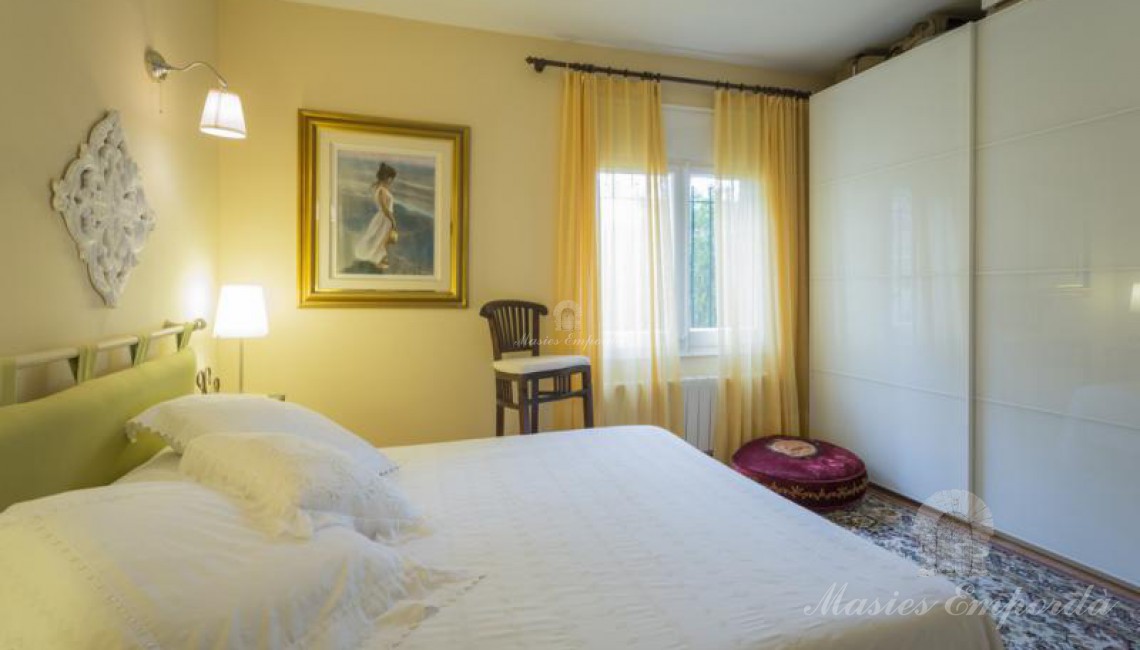 Perspectiva de un de las suites de la casa 