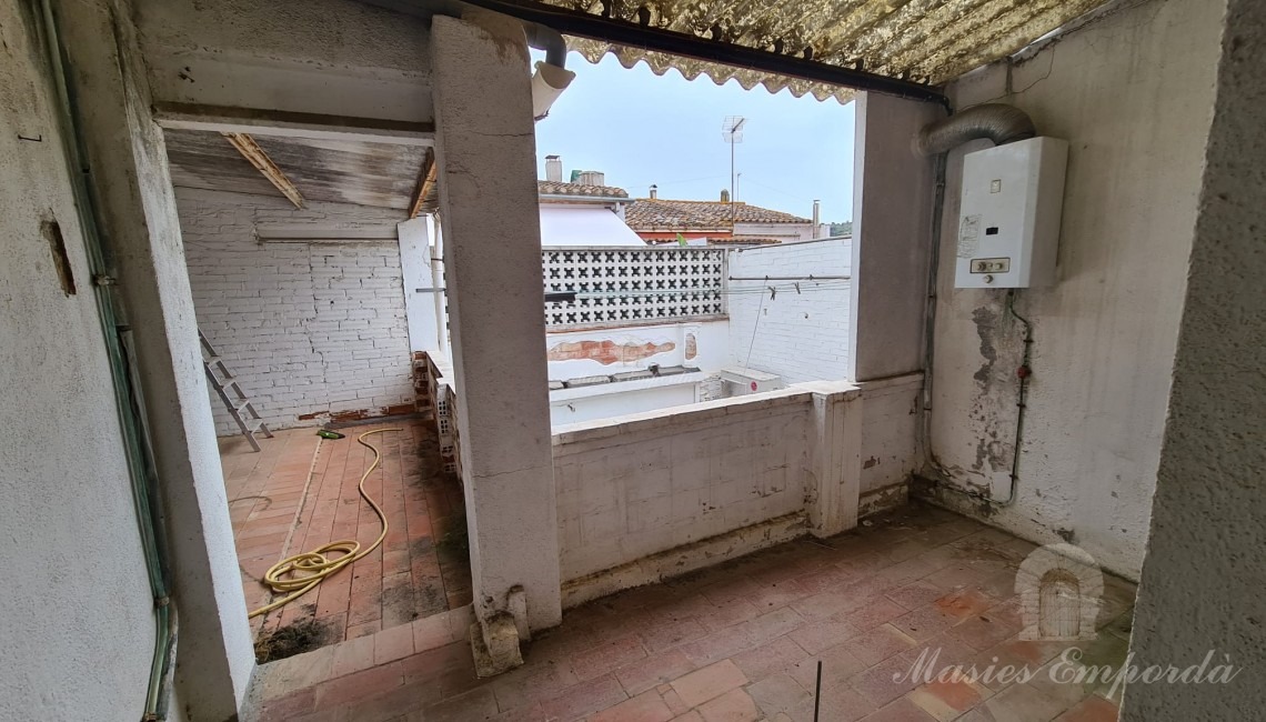 Covered terrace overlooking inner courtyard