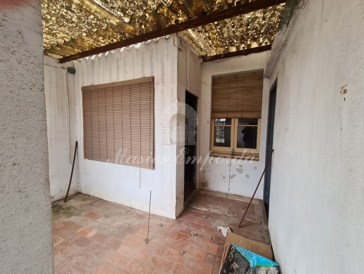Covered terrace overlooking inner courtyard